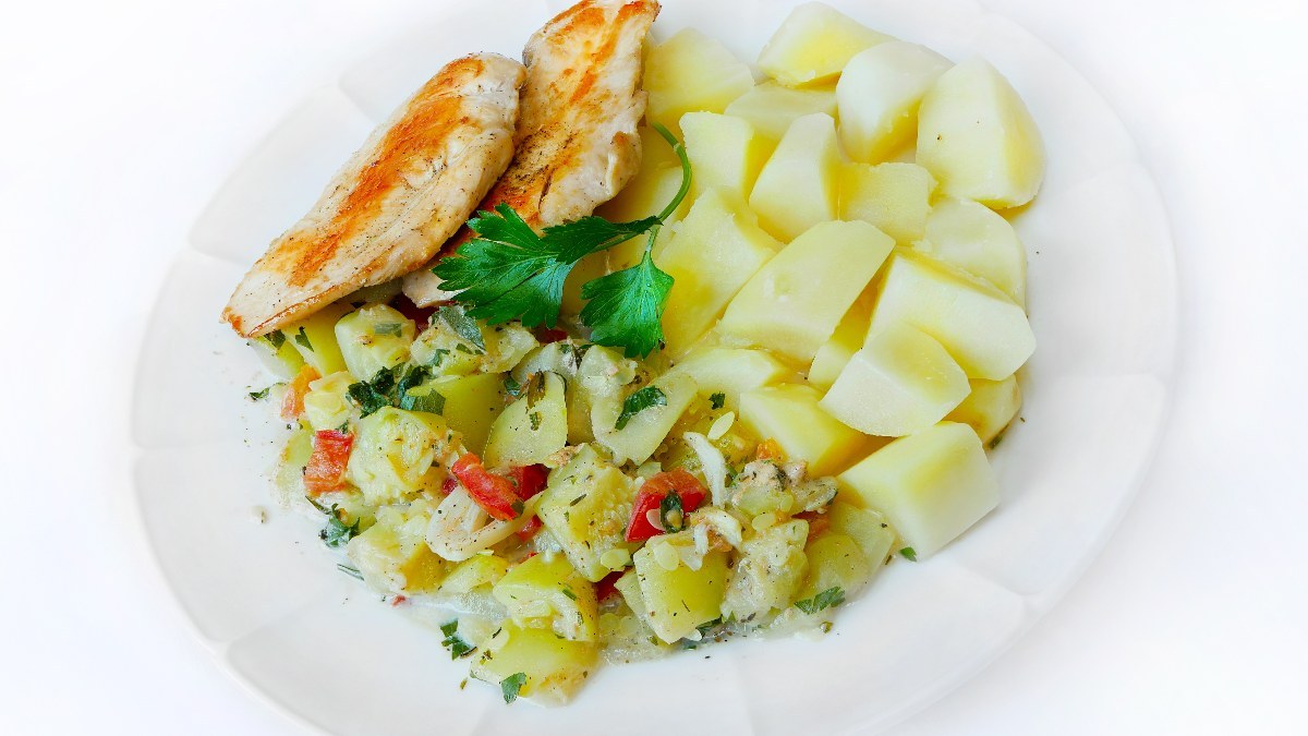 Lunch dish (pumpkin sauce, potatoes, and chicken steak)