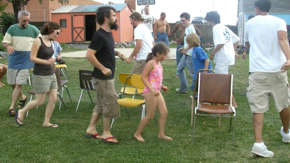 Playing musical chairs at the Our Community Place Lawn Jam in Harrisonburg, Virginia on June 28, 2008.